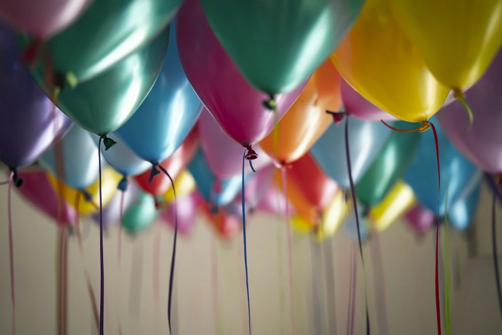 Colourful balloons arranged for a birthday celebration